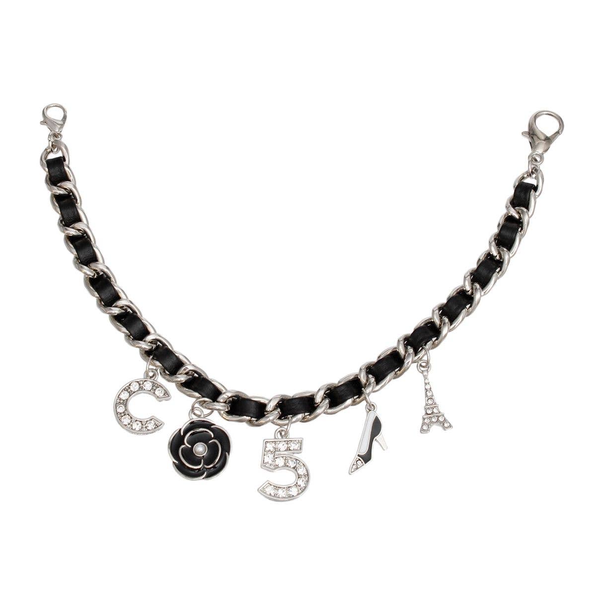 Mini Bucket Black Quilted Silver Camellia Luxe Bag: Black / Rhodium / 9 x 4 x 5.5 inches